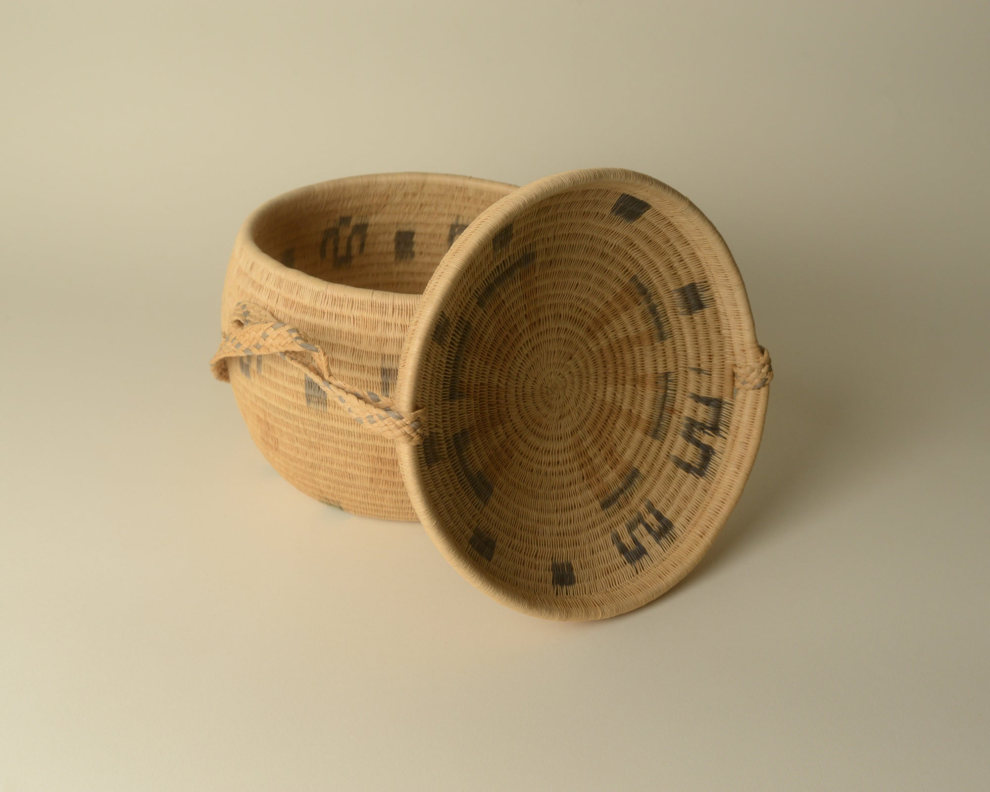 Woven Venezuelan basket with sliding lid.