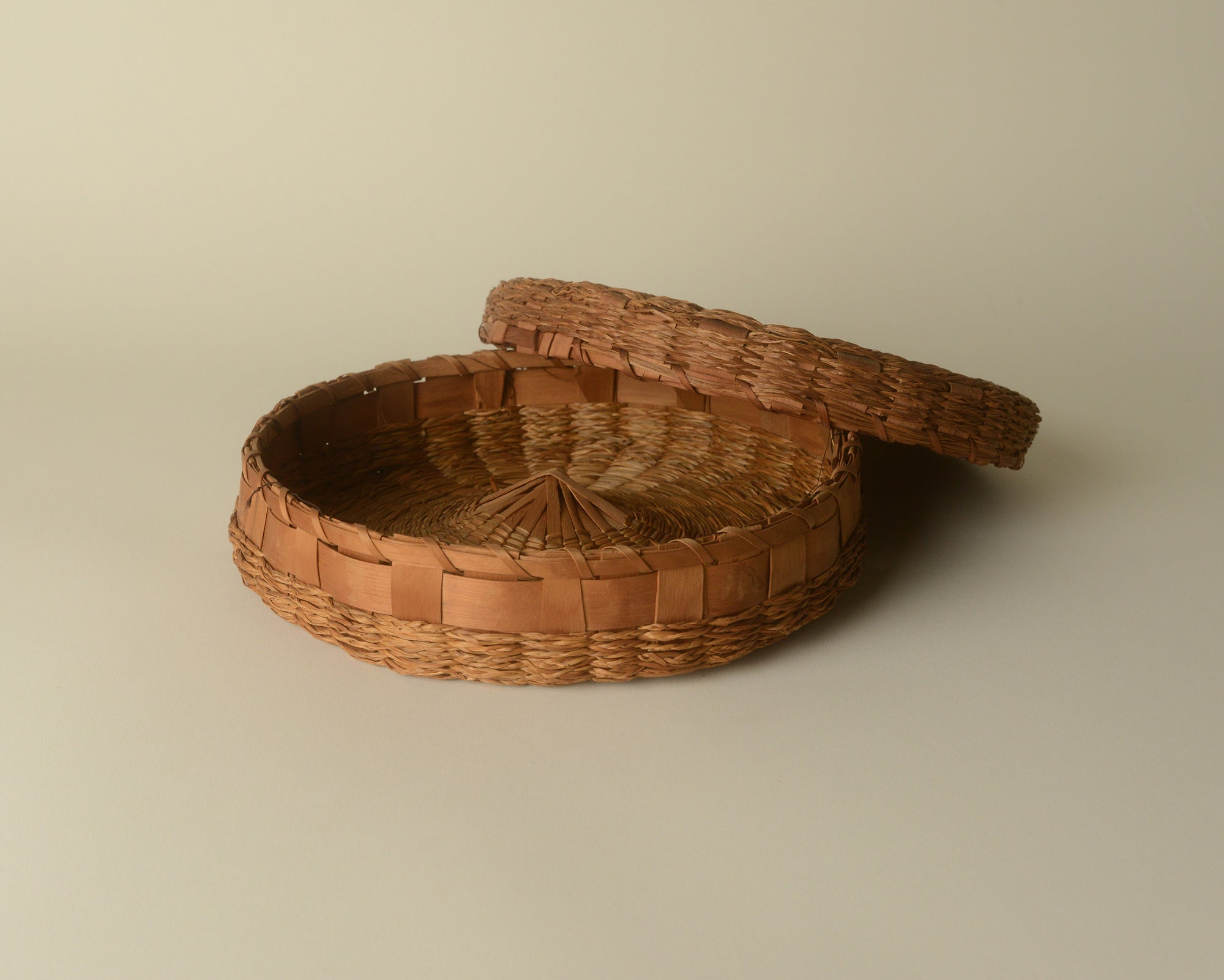 Vintage sweetgrass sewing basket.