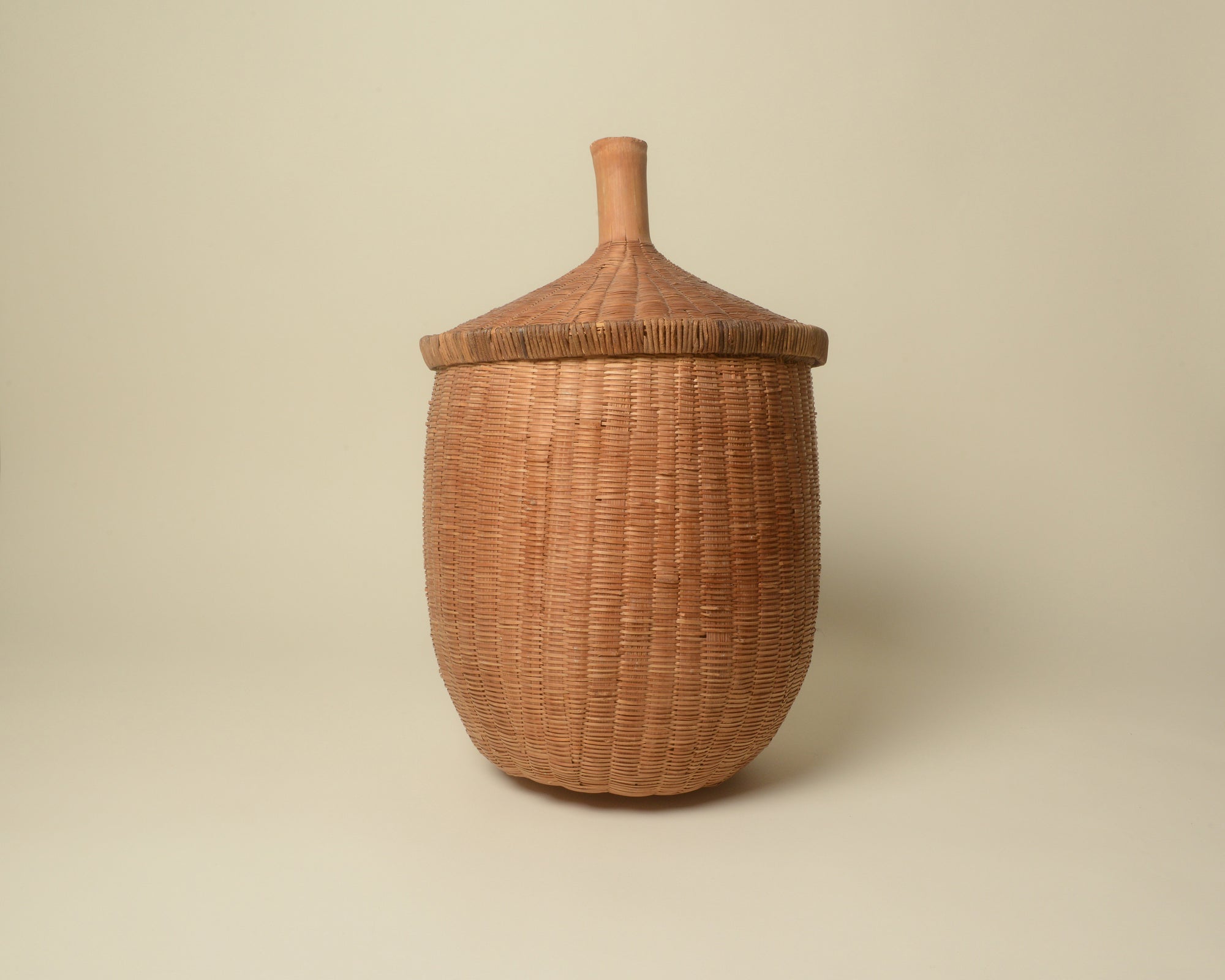 Large lidded woven bin from West Africa.