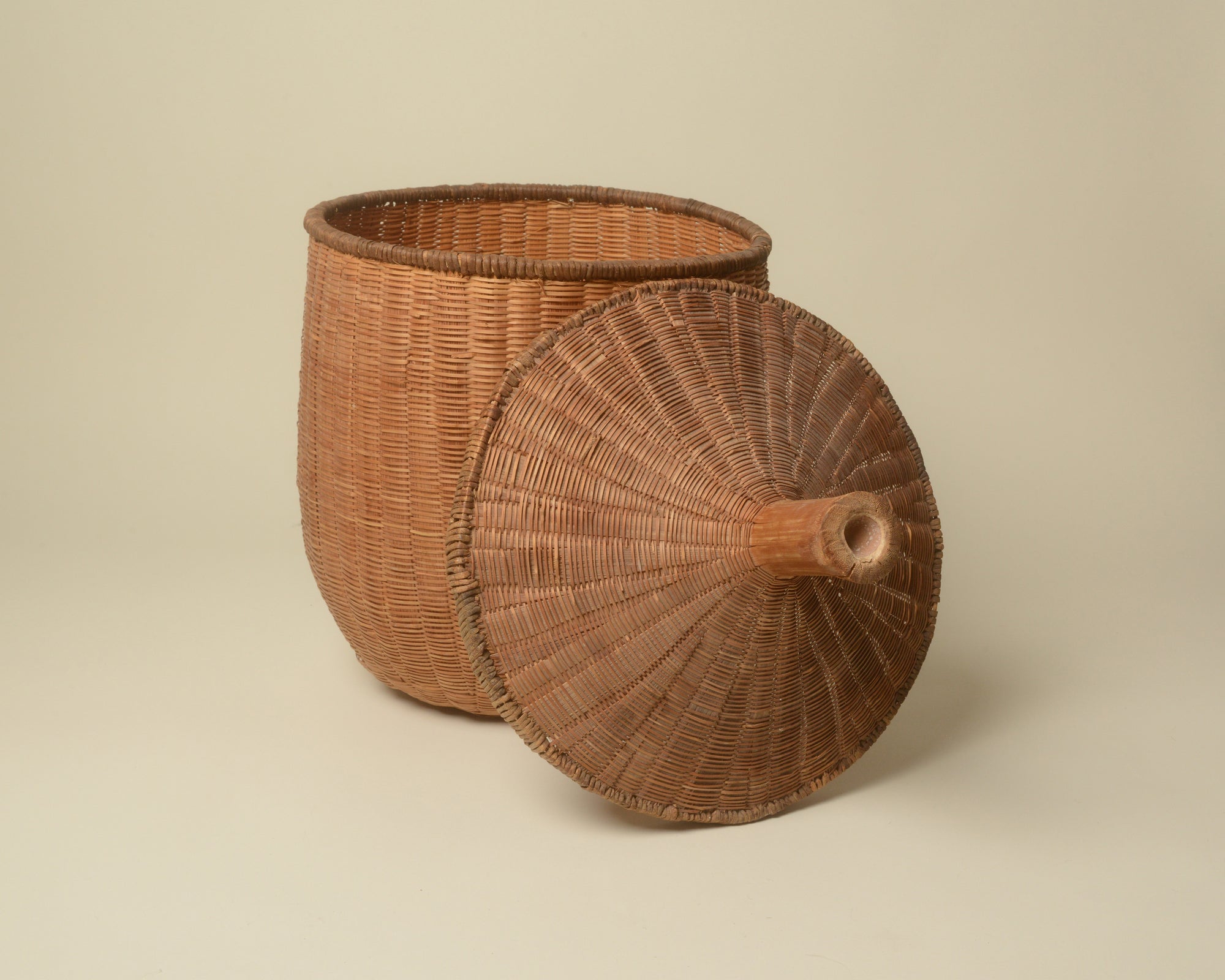 Large lidded woven bin from West Africa.