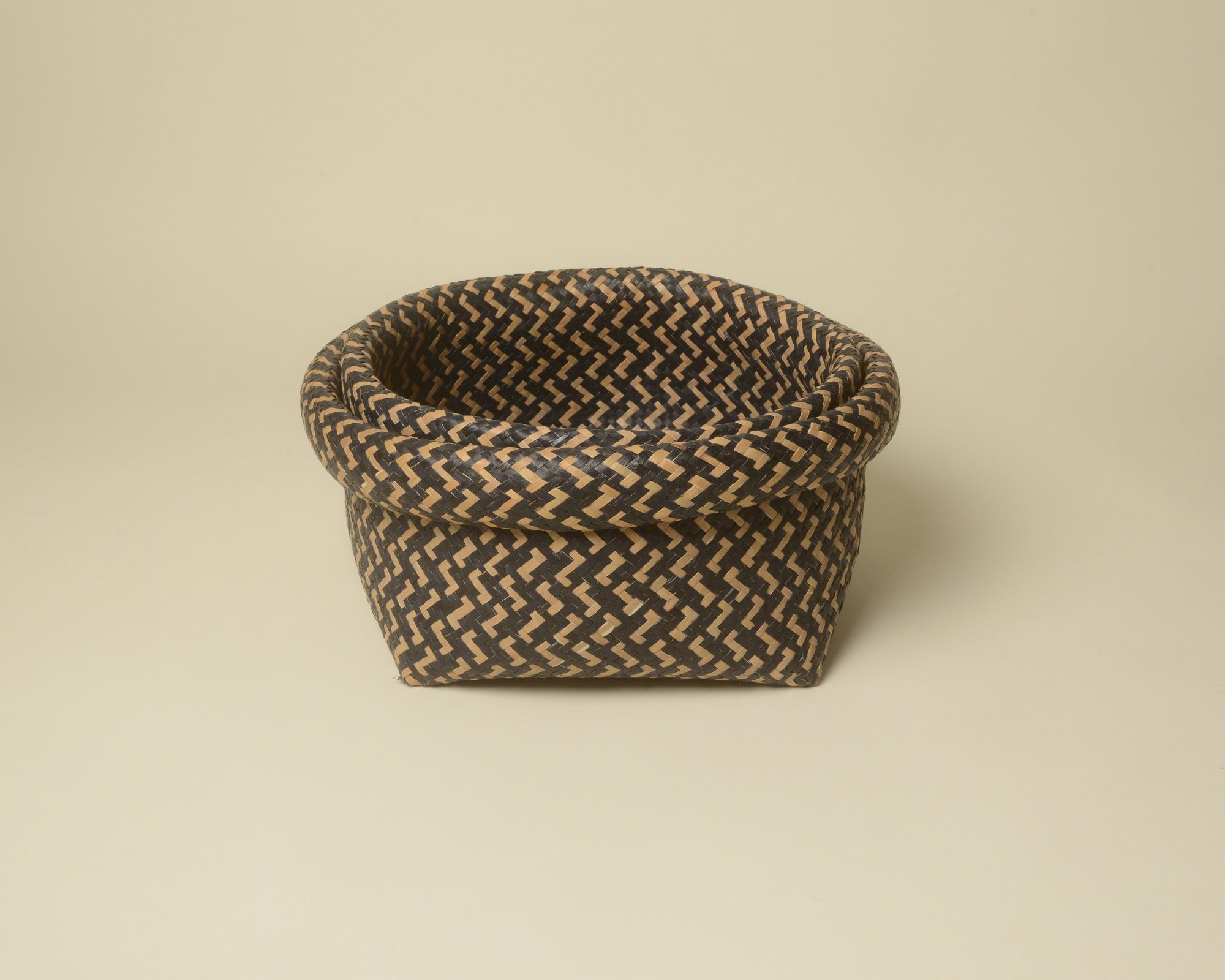 Pair of large nested woven baskets from Thailand.