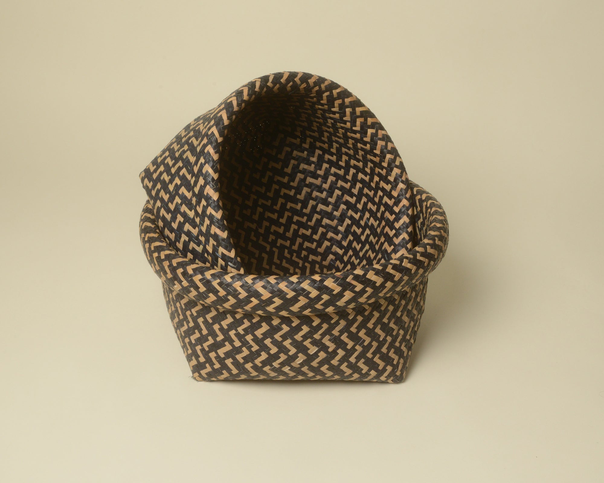 Pair of large nested woven baskets from Thailand.