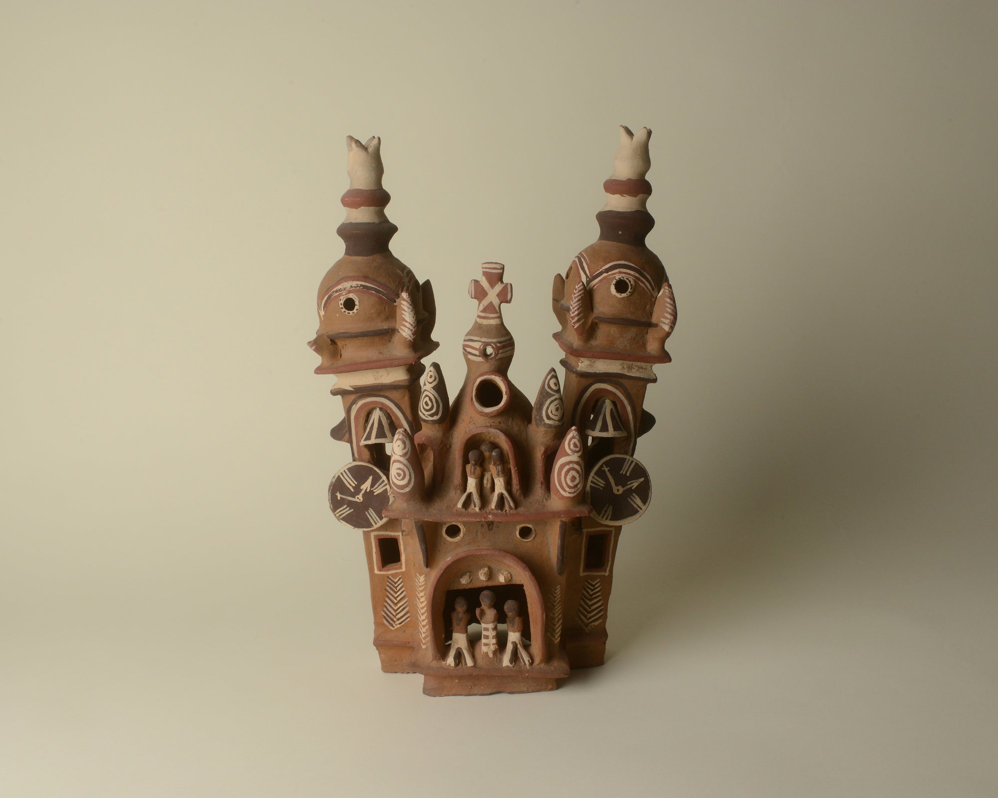 Peruvian clay church, hand-modeled and painted. Retablo tradition.