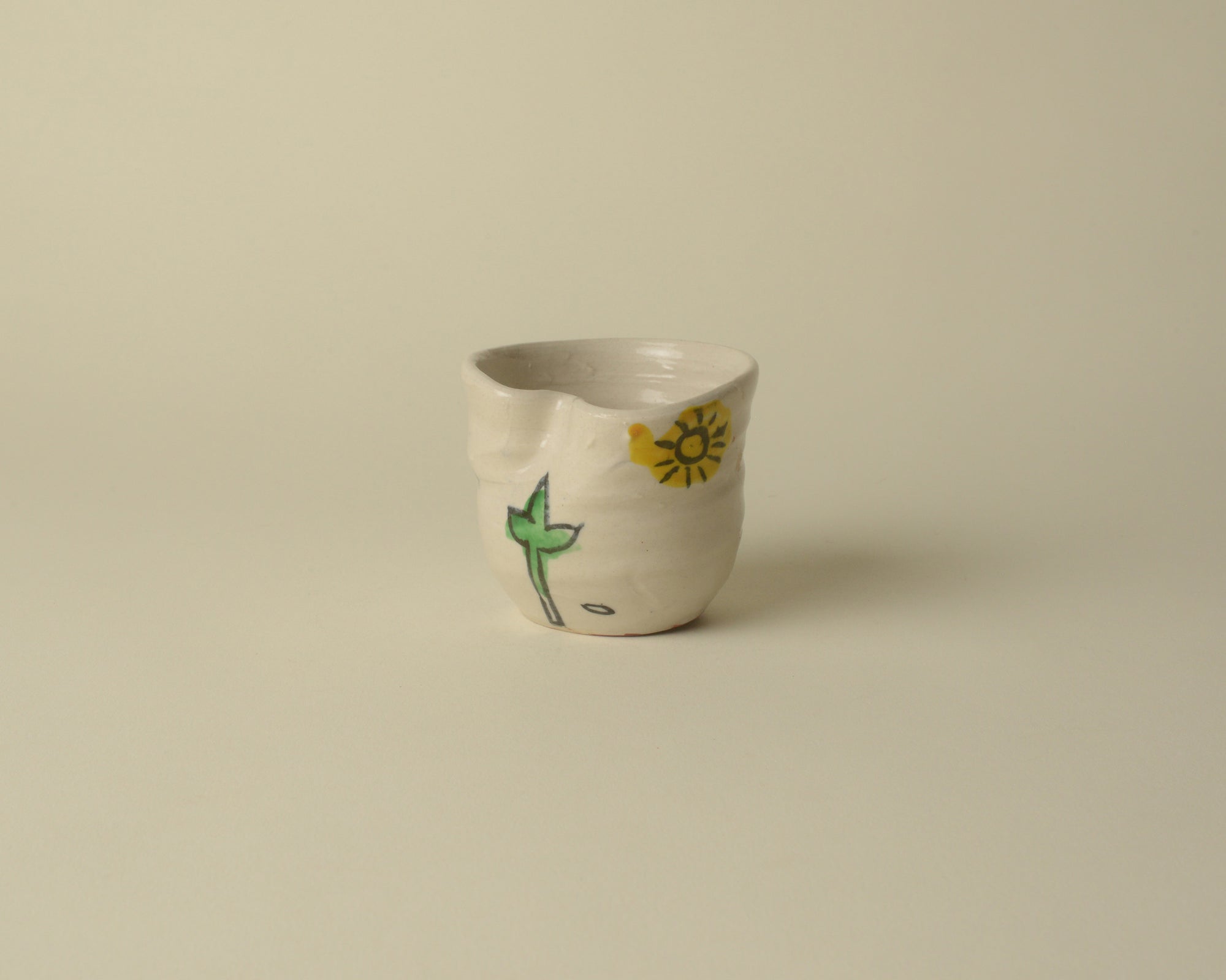 Small Childlike Japanese Ceramic Cup.