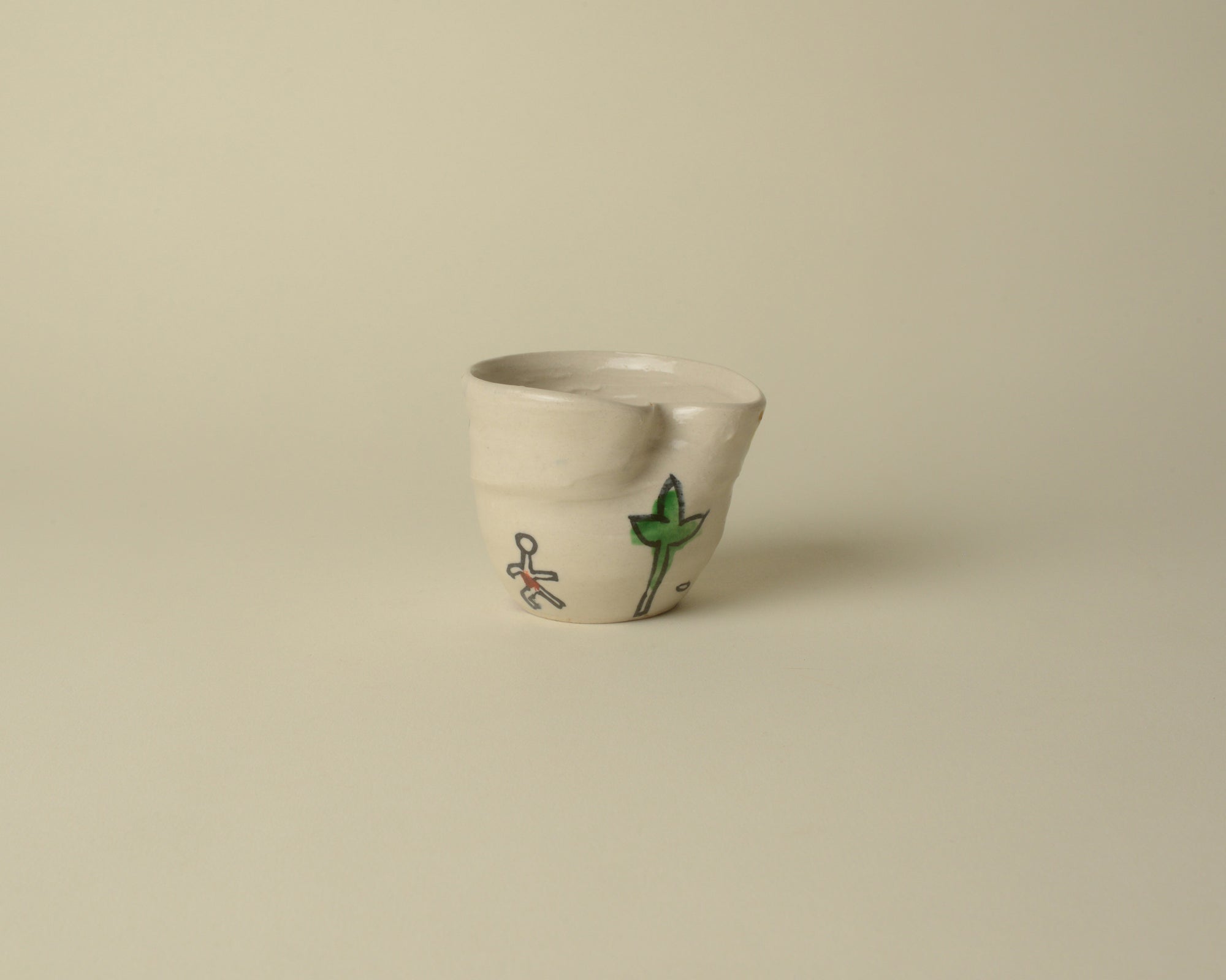 Small Childlike Japanese Ceramic Cup.