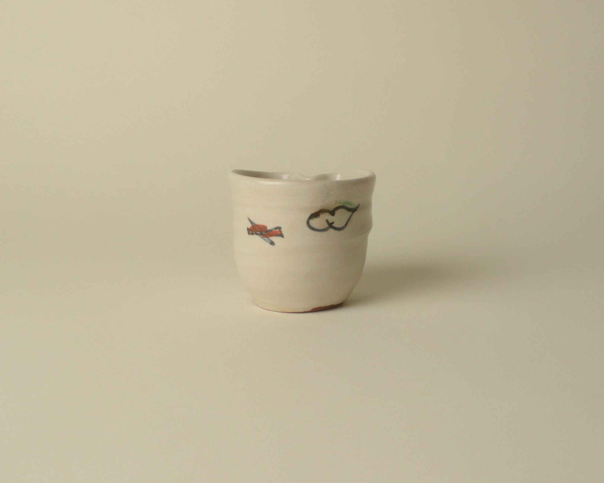 Small Childlike Japanese Ceramic Cup.