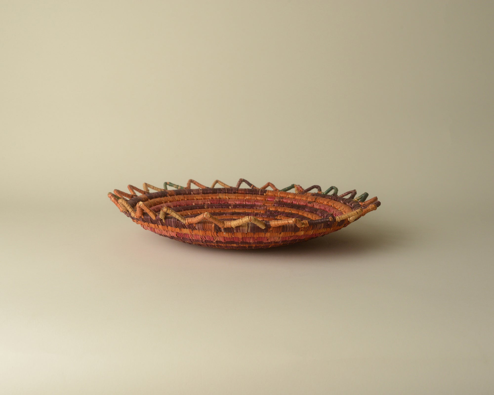 Sun-shaped coiled seagrass platter.
