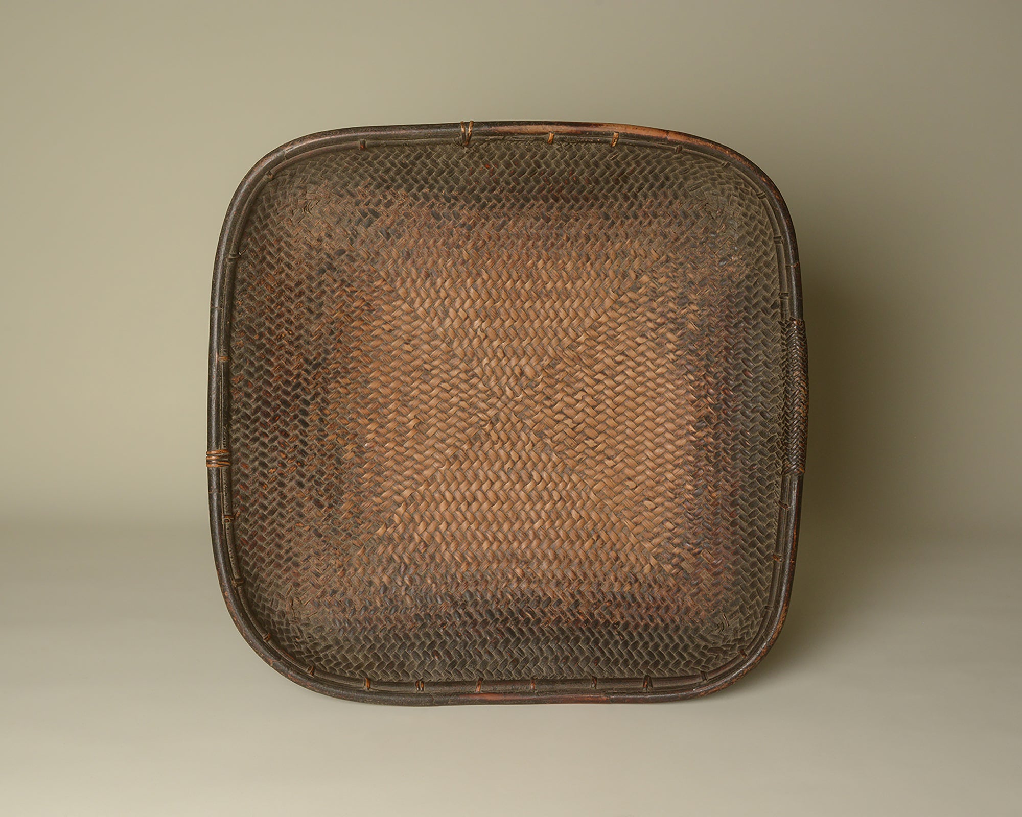 Antique winnowing tray from the Ifugao highlands of the Philippines.
